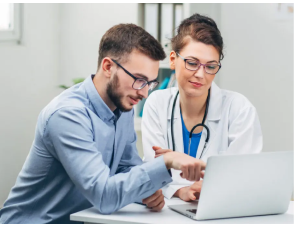 Confident doctor shaking patient's hand